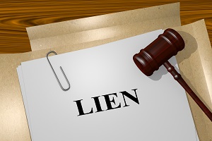 LIEN title on legal document with gavel on it | hoa liens