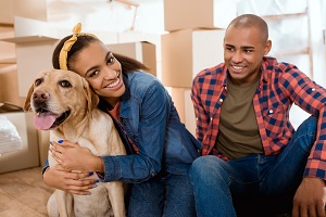 family with labrador dog moving to new apartment | hoa pet restrictions
