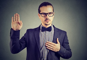 man formal clothing and eyeglasses swearing in being trustworthy | role of an HOA vice president