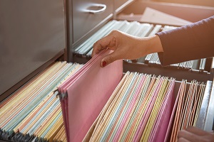 documents in files placed in the filing cabinet | responsibilities of an HOA secretary