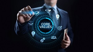 man checking digital icons with core values in center | hoa board strategic planning