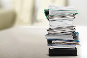 pile of documents | hoa yearly checklist