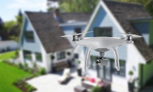 Drone quad copter in mid air in front of the house | drone and invasion of privacy
