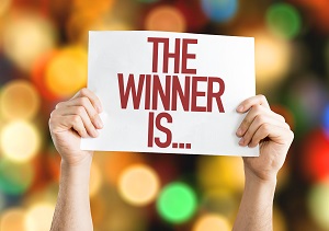 The Winner Is... placard with bokeh background | maintain curb appeal in HOA community
