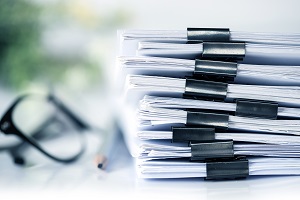 stacking of office working document with paper clip folder | hoa water damage