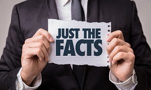 man in suin holding a paper where "Just the Facts" is written | best social media practices for HOA