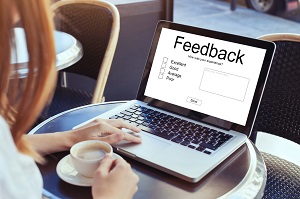 person writing a feedback online | types of hoa resolutions