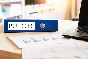 Office folder with inscription Policies | hoa resolutions policy