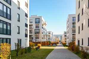 Modern apartment buildings in a green residential area in the city | what is community association management