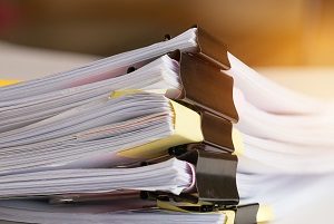 Stack of Paper documents with clip | homeowners' complaints