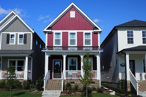 Two story, red, row house in a suburban neighborhood in North Carolina | Best Places to Live Near Raleigh NC