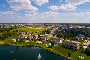 aerial image of single family homes in Bettendorf Iowa USA | what is a pud