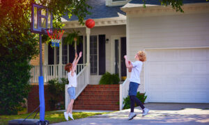 basketball hoop in front of the house